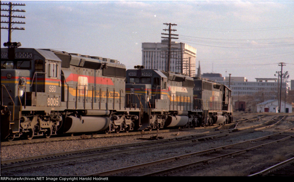 SBD 3613 leads a pair of SD40-2's past the station late n the afternoon